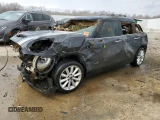 2017 MINI Clubman Cooper S with VIN WMWLU5C54H2C45860, listed as a Copart auction lot 49397995 with 103,879 mi miles and Non Repairable. Bid and sale history available at carsss.com. Image 1.