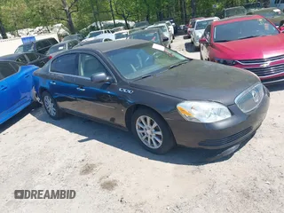 2009 Buick Lucerne CXL with VIN 1G4HD57M59U122626, listed as a IAAI auction lot 42004989 with 184,026 mi miles. Bid and sale history available at carsss.com. Image 1.