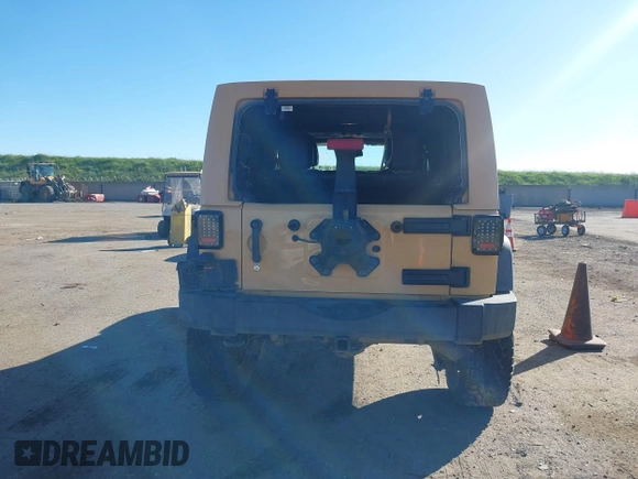 2013 Jeep Wrangler Unlimited Rubicon with VIN 1C4BJWFG3DL632668, listed as a IAAI auction lot 41751546 with 153,149 mi miles. Bid and sale history available at carsss.com. Image 15.