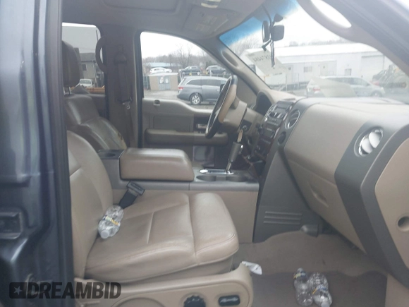 2005 Ford F-150 XLT with VIN 1FTPW14565KE80310, listed as a IAAI auction lot 41874484 with 173,315 mi miles. Bid and sale history available at carsss.com. Image 5.