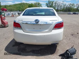 2012 Buick LaCrosse Premium 1 z VIN 1G4GD5E34CF130301, wystawiony jako IAAI lot #42205574 z przebiegiem 117 941 mil mil oraz . Historia ofert i sprzedaży dostępna na DreamBid. Obrazek 17.