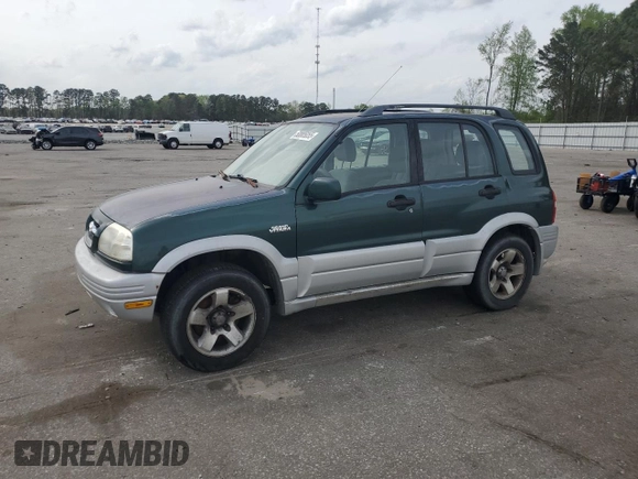 1999 Suzuki Grand Vitara JLX z VIN JS3TD62V0X4124366, wystawiony jako Copart lot #50885055 z przebiegiem 204 168 mil mil oraz Szkoda całkowita • Salvage title. Historia ofert i sprzedaży dostępna na DreamBid. Obrazek 1.