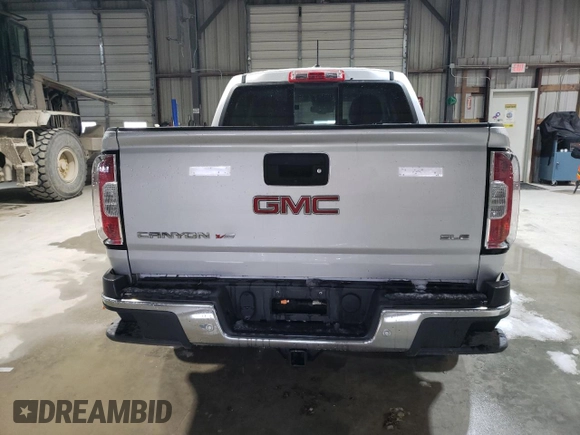 2020 GMC Canyon 4WD SLE with VIN 1GTG6CENXL1217671, listed as a Copart auction lot 44781435 with 24,591 mi miles and Salvage Title. Bid and sale history available at carsss.com. Image 6.