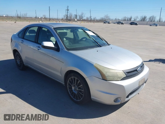 2011 Ford Focus SES with VIN 1FAHP3GN4BW136106, listed as a IAAI auction lot 41738992 with 163,167 mi miles. Bid and sale history available at carsss.com. Image 1.