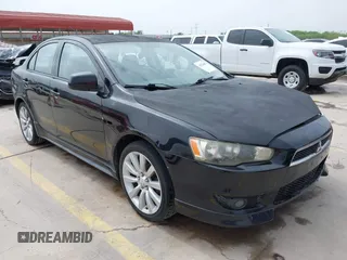 2009 Mitsubishi Lancer with VIN JA3AU86W29U039924, listed as a IAAI auction lot 41923692 with 183,591 mi miles and . Bid and sale history available at DreamBid. Image 1.