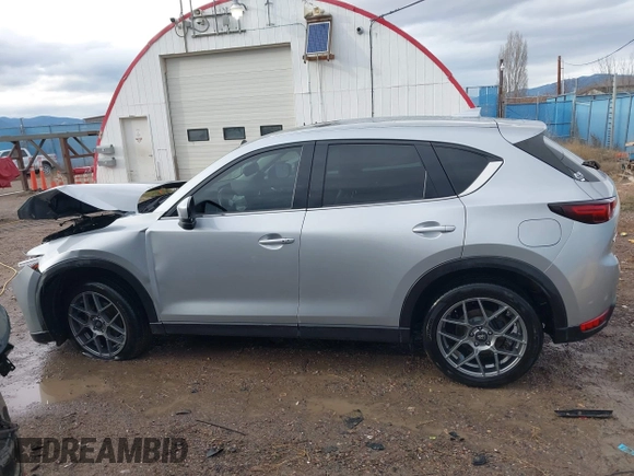 2018 Mazda CX-5 Grand Touring с VIN JM3KFBDM8J0326492, выставлен на аукционе IAAI как лот 40928841 с пробегом 114 848 миль миль и . История ставок и продаж доступна на DreamBid. Изображение 15.