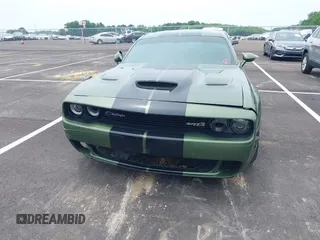 2021 Dodge Challenger R/T Scat Pack z VIN 2C3CDZFJ2MH559741, wystawiony jako IAAI lot #42264991 z przebiegiem 51 040 mil mil oraz . Historia ofert i sprzedaży dostępna na DreamBid. Obrazek 12.