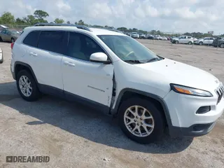 2015 Jeep Cherokee Latitude with VIN 1C4PJMCB4FW595084, listed as a IAAI auction lot 41880572 with 146,750 mi miles. Bid and sale history available at carsss.com. Image 1.