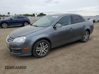 2006 Volkswagen Jetta z VIN 3VWDG71K66M748387, wystawiony jako Copart lot #55269553 z przebiegiem 141 937 mil mil oraz Czysty tytuł • Clean title. Historia ofert i sprzedaży dostępna na DreamBid. Obrazek 1.