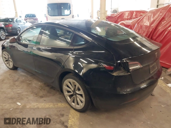 2022 Tesla Model 3 with VIN 5YJ3E1EA4NF187113, listed as a IAAI auction lot 41712331 with 81,879 mi miles and . Bid and sale history available at DreamBid. Image 3.