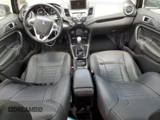 2014 Ford Fiesta Titanium z VIN 3FADP4FJXEM228098, wystawiony jako Copart lot #55173975 z przebiegiem 109 311 mil mil oraz Szkoda całkowita • Salvage title. Historia ofert i sprzedaży dostępna na DreamBid. Obrazek 8.