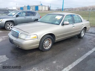 1999 Ford Crown Victoria LX with VIN 2FAFP74W0XX179512, listed as a IAAI auction lot 41124866 with 101,282 mi miles. Bid and sale history available at carsss.com. Image 18.
