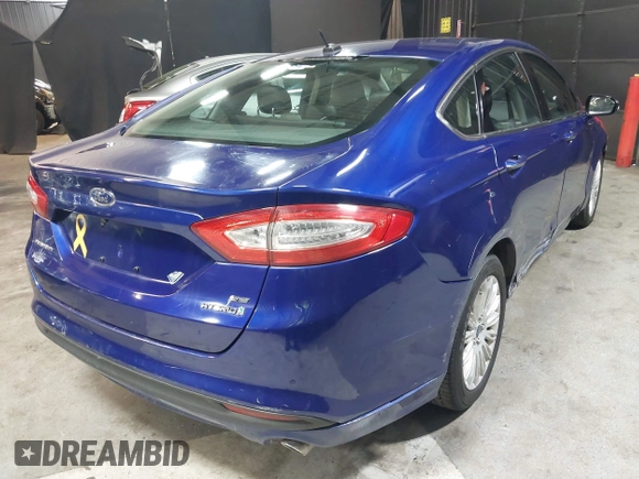 2016 Ford Fusion SE Hybrid with VIN 3FA6P0LU0GR242288, listed as a IAAI auction lot 41867085 with 114,063 mi miles. Bid and sale history available at carsss.com. Image 4.