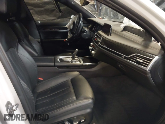 2019 BMW 7 Series 740i xDrive with VIN WBA7E4C59KGV70391, listed as a IAAI auction lot 41531991 with 70,017 mi miles and . Bid and sale history available at carsss.com. Image 5.