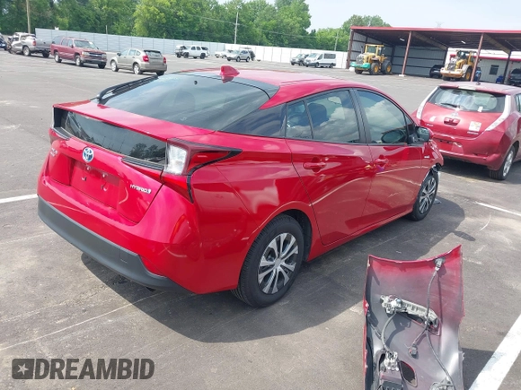 2021 Toyota Prius LE with VIN JTDL9MFU0M3029880, listed as a IAAI auction lot 42450003 with 91,558 mi miles and . Bid and sale history available at DreamBid. Image 4.
