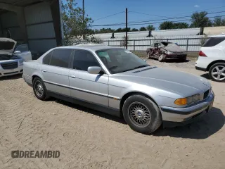 1999 BMW 7 Series 740il with VIN WBAGH8332XDP00274, listed as a Copart auction lot 74191654 with 134,901 mi miles and Salvage Title. Bid and sale history available at carsss.com. Image 4.