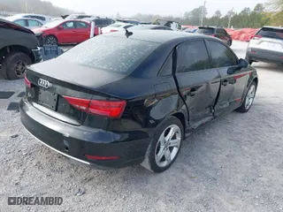 2017 Audi A3 Sedan Premium with VIN WAUAUGFF0H1059503, listed as a IAAI auction lot 41882348 with 121,258 mi miles. Bid and sale history available at carsss.com. Image 4.