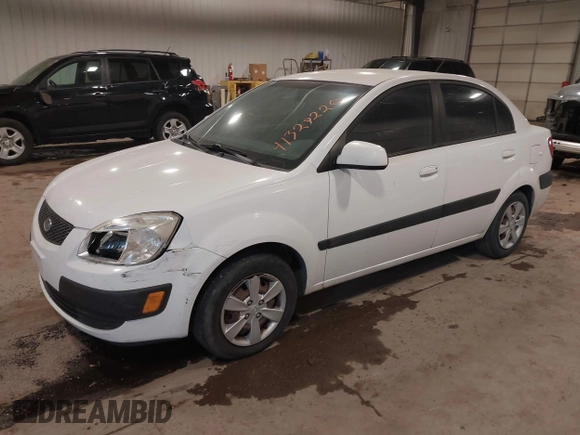 2009 Kia Rio SX with VIN KNADE223896533839, listed as a IAAI auction lot 41328220 with 140,968 mi miles. Bid and sale history available at carsss.com. Image 2.