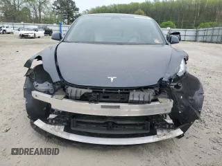 2021 Tesla Model 3 Performance with VIN 5YJ3E1EC5MF984986, listed as a Copart auction lot 52010205 with 48,012 mi miles and Salvage Title. Bid and sale history available at DreamBid. Image 5.