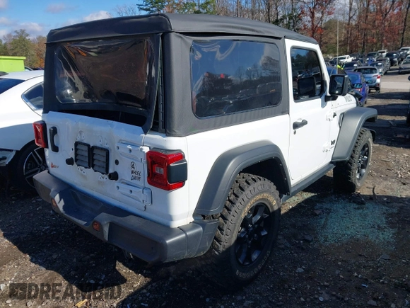 2021 Jeep Wrangler Sport S with VIN 1C4HJXAG0MW757133, listed as a IAAI auction lot 41028980 with 53,165 mi miles and . Bid and sale history available at DreamBid. Image 4.