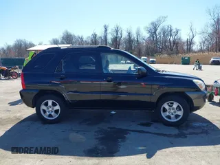2007 Kia Sportage LX with VIN KNDJF724877313178, listed as a IAAI auction lot 41863492 with 199,138 mi miles. Bid and sale history available at carsss.com. Image 13.