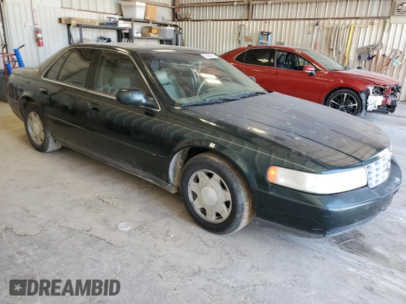 1999 Cadillac Seville Luxury SLS z VIN 1G6KS54Y5XU920020, wystawiony jako Copart lot #53956115 z przebiegiem 104 096 mil mil oraz Czysty tytuł • Clean title. Historia ofert i sprzedaży dostępna na DreamBid. Obrazek 4.
