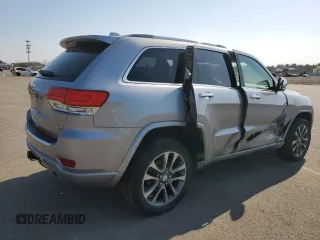 2018 Jeep Grand Cherokee Overland z VIN 1C4RJFCM3JC401399, wystawiony jako Copart lot #53167035 z przebiegiem 87 886 mil mil oraz Nie do naprawy • Non repairable. Historia ofert i sprzedaży dostępna na DreamBid. Obrazek 3.