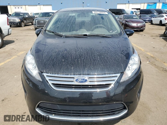 2012 Ford Fiesta SE with VIN 3FADP4BJ3CM118089, listed as a Copart auction lot 68630084 with 49,010 mi miles and Salvage Title. Bid and sale history available at DreamBid. Image 5.