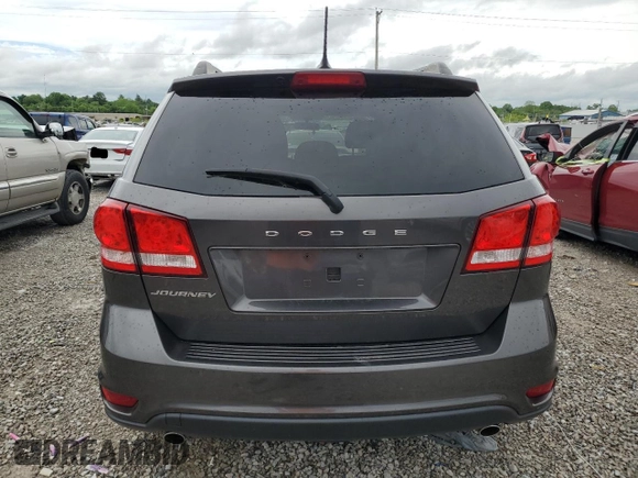 2017 Dodge Journey SXT z VIN 3C4PDCBG3HT516401, wystawiony jako Copart lot #56498445 z przebiegiem 65 156 mil mil oraz Szkoda całkowita • Salvage title. Historia ofert i sprzedaży dostępna na DreamBid. Obrazek 6.