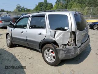 2003 Mazda Tribute DX with VIN 4F2YZ02B83KM52472, listed as a Copart auction lot 68642804 with 179,193 mi miles and Salvage Title. Bid and sale history available at carsss.com. Image 2.