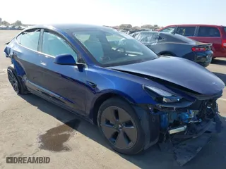 2023 Tesla Model 3 with VIN 5YJ3E1EA9PF697573, listed as a IAAI auction lot 41173833 with 6,966 mi miles. Bid and sale history available at carsss.com. Image 1.
