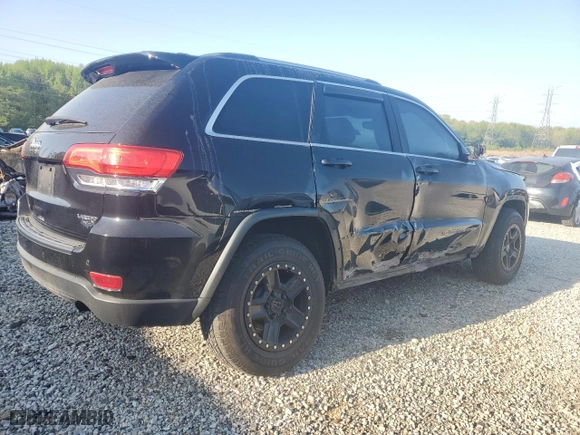 2017 Jeep Grand Cherokee Laredo with VIN 1C4RJEAG0HC647750, listed as a Copart auction lot 52619875 with 105,464 mi miles and Salvage Title. Bid and sale history available at carsss.com. Image 3.