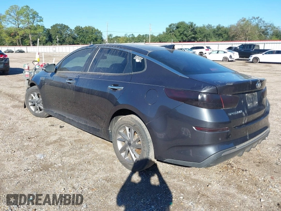 2019 Kia Optima LX with VIN 5XXGT4L3XKG292437, listed as a IAAI auction lot 40682048 with 151,012 mi miles. Bid and sale history available at carsss.com. Image 3.