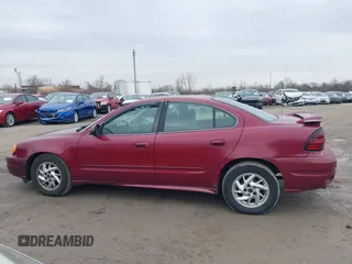 2004 Pontiac Grand Am SE with VIN 1G2NE52F14M652117, listed as a IAAI auction lot 41747762 with 187,422 mi miles. Bid and sale history available at carsss.com. Image 14.