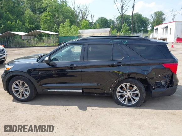 2023 Ford Explorer XLT with VIN 1FMSK8DH2PGA54527, listed as a IAAI auction lot 42463206 with 26,420 mi miles and . Bid and sale history available at DreamBid. Image 14.