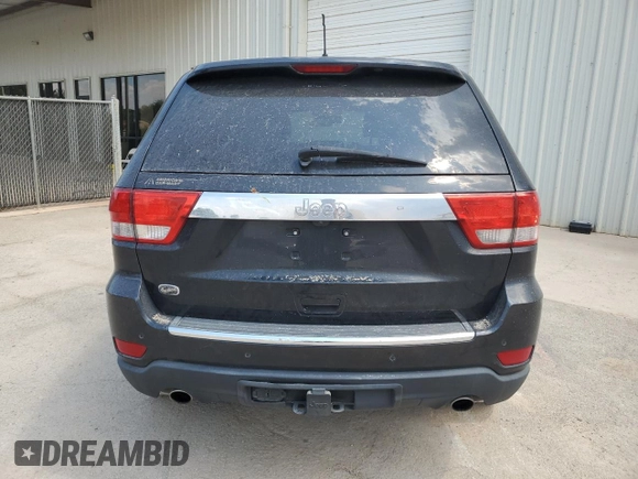 2013 Jeep Grand Cherokee Overland with VIN 1C4RJECT7DC526119, listed as a Copart auction lot 60735594 with 143,454 mi miles and Clean Title. Bid and sale history available at carsss.com. Image 6.