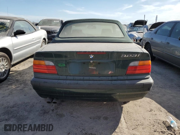 1999 BMW 3 Series 323icA with VIN WBABJ8332XEM23389, listed as a Copart auction lot 76185804 with 0 mi miles and Salvage Title. Bid and sale history available at carsss.com. Image 6.