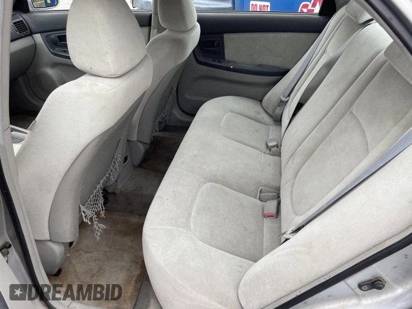 2004 Kia Spectra LX with VIN KNAFE121845043143, listed as a IAAI auction lot 41574523 with 211,758 mi miles. Bid and sale history available at carsss.com. Image 8.