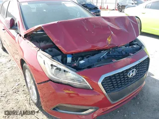2016 Hyundai Sonata Hybrid SE with VIN KMHE24L19GA016239, listed as a IAAI auction lot 40813246 with 118,031 mi miles. Bid and sale history available at carsss.com. Image 6.