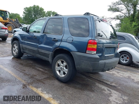 2005 Ford Escape XLT with VIN 1FMYU03165KD74390, listed as a IAAI auction lot 42799963 with 262,762 mi miles and . Bid and sale history available at DreamBid. Image 3.