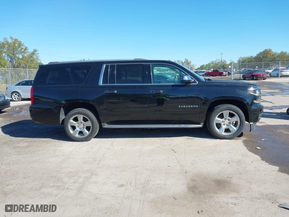 2017 Chevrolet Suburban Premier with VIN 1GNSKJKC0HR114398, listed as a IAAI auction lot 41745611 with 211,906 mi miles. Bid and sale history available at carsss.com. Image 13.