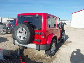 2011 Jeep Wrangler Sahara with VIN 1J4AA5D18BL561687, listed as a IAAI auction lot 41435436 with 76,284 mi miles and . Bid and sale history available at DreamBid. Image 4.