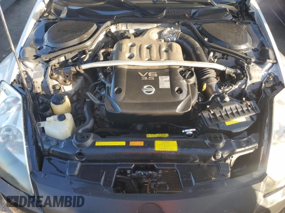 2004 Nissan 350Z Enthusiast z VIN JN1AZ36A74T015422, wystawiony jako Copart lot #77537194 z przebiegiem 147 466 mil mil oraz Nie do naprawy • Non repairable. Historia ofert i sprzedaży dostępna na DreamBid. Obrazek 11.