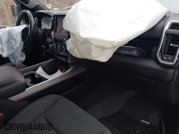 2021 Ram 1500 Big Horn with VIN 1C6SRFFT1MN721561, listed as a IAAI auction lot 42017023 with 62,023 mi miles and . Bid and sale history available at DreamBid. Image 5.