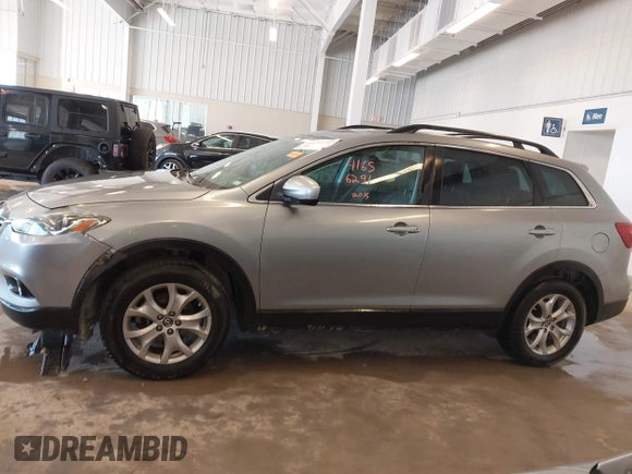 2015 Mazda CX-9 Touring with VIN JM3TB3CV5F0464675, listed as a IAAI auction lot 41656291 with 127,033 mi miles. Bid and sale history available at carsss.com. Image 15.