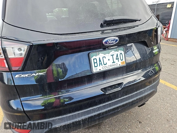 2018 Ford Escape SE z VIN 1FMCU9GDXJUA69802, wystawiony jako IAAI lot #42413413 z przebiegiem 92 564 mil mil oraz . Historia ofert i sprzedaży dostępna na DreamBid. Obrazek 22.