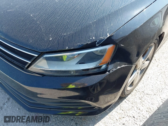 2015 Volkswagen Jetta SE with VIN 3VWD07AJ9FM411420, listed as a IAAI auction lot 40246311 with 141,456 mi miles and . Bid and sale history available at DreamBid. Image 12.