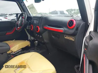 2018 Jeep Wrangler Unlimited Sport S with VIN 1C4BJWDG6JL818719, listed as a IAAI auction lot 42412991 with 58,399 mi miles and . Bid and sale history available at DreamBid. Image 5.
