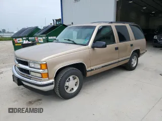 1999 Chevrolet Tahoe z VIN 1GNEC13R0XJ485362, wystawiony jako Copart lot #60436695 z przebiegiem 115 060 mil mil oraz Czysty tytuł • Clean title. Historia ofert i sprzedaży dostępna na DreamBid. Obrazek 1.