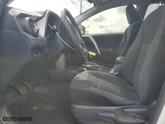2018 Toyota RAV4 LE with VIN JTMBFREV9JD256759, listed as a Copart auction lot 51165835 with 128,253 mi miles and Salvage Title. Bid and sale history available at carsss.com. Image 7.